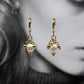 Petites boucles oreilles clochette perle